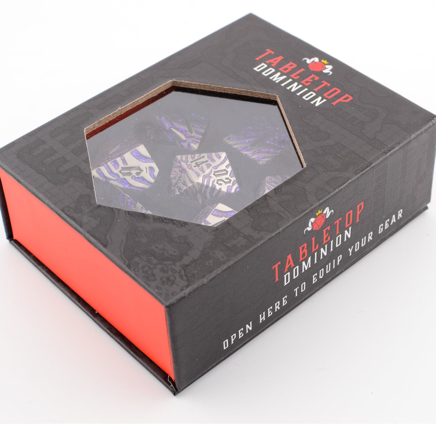 Tabletop Dominion Nebula Covenant solid metal dice set in a closed display box, showing purple‑sparkle metal dice through the hexagonal window.