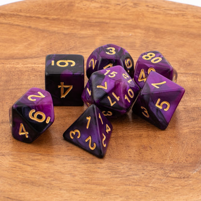 Twilight Shroud acrylic dice arranged across a wooden surface.