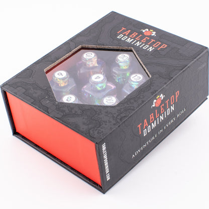 Tabletop Dominion Prismatic Elixir potion bottle dice set in a closed display box with iridescent dice visible.
