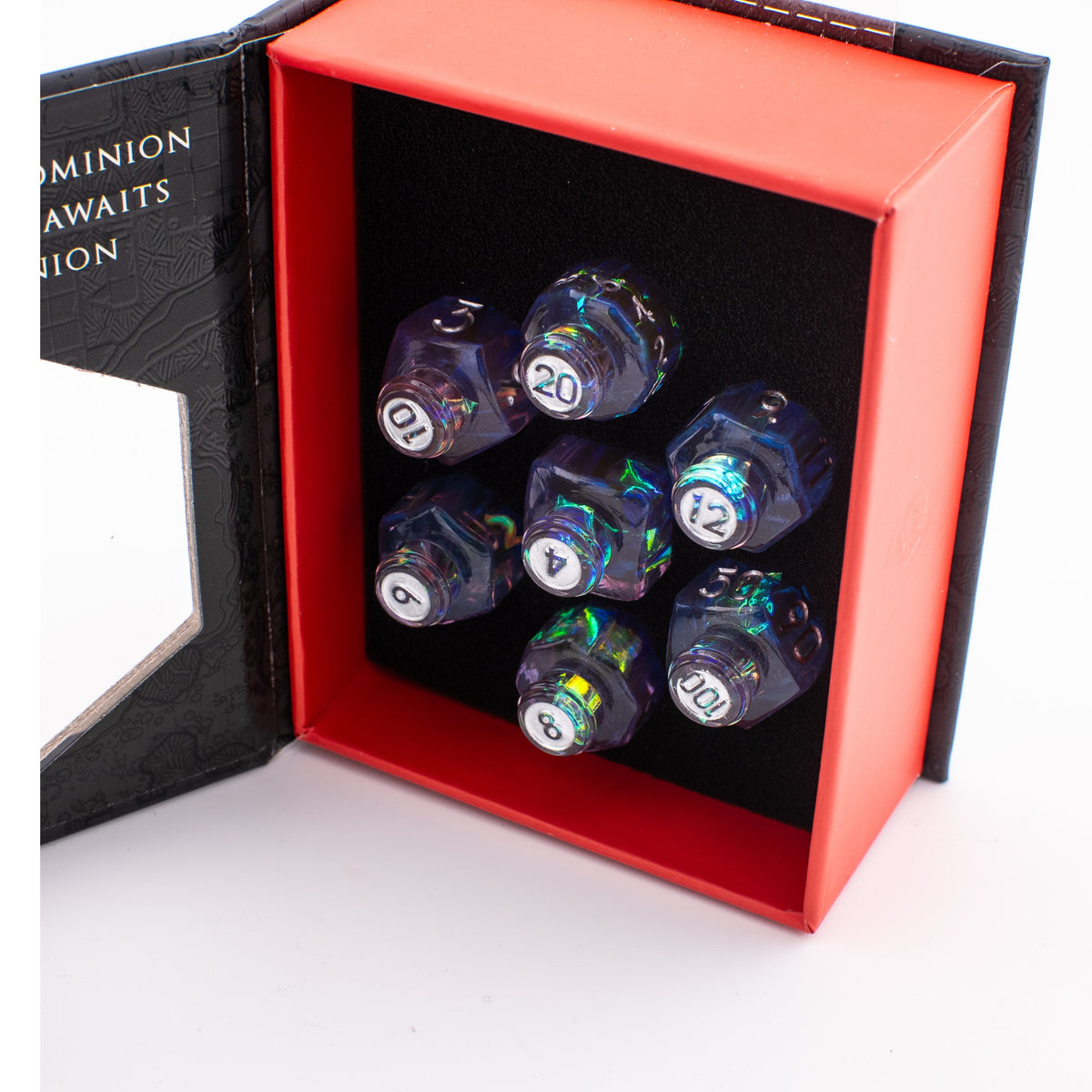 Tabletop Dominion Prismatic Elixir potion bottle dice set displayed in an open box with iridescent resin dice in foam.