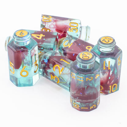 Tabletop Dominion Blood Alchemist potion bottle dice shown grouped together on a white background, with red and blue accents