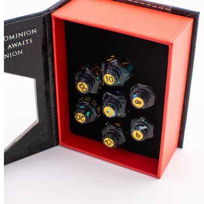 Tabletop Dominion Blood Alchemist potion bottle dice set displayed in an open box with seven dark dice in foam.