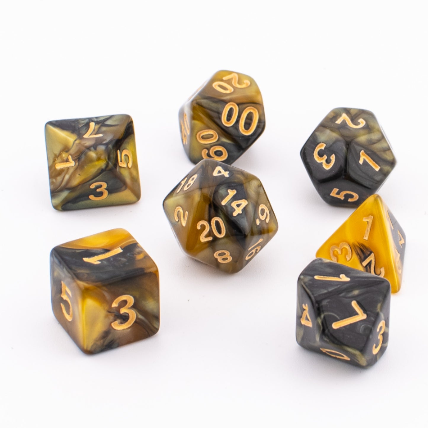 Venomous Sting acrylic dice arranged on a white background in black, yellow, and brown tones.
