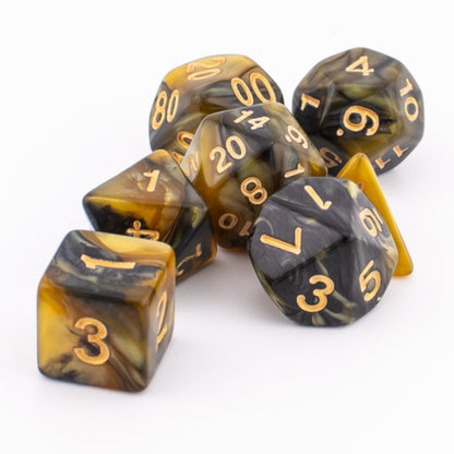 Clustered Venomous Sting acrylic dice showing black, yellow, and brown marbled swirls.