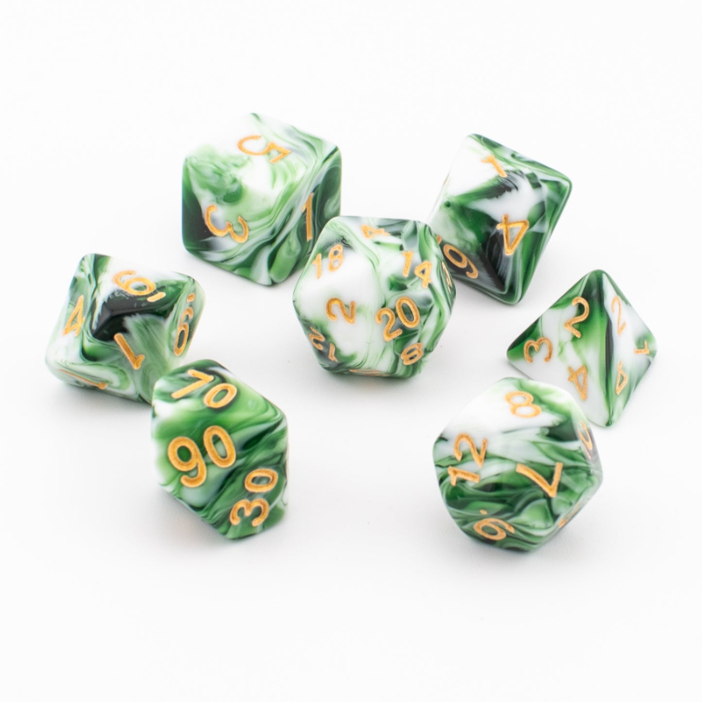 Green and white Forest Sprout acrylic dice arranged on a white background.