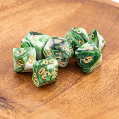 Forest Sprout acrylic dice arranged neatly on a wooden surface.