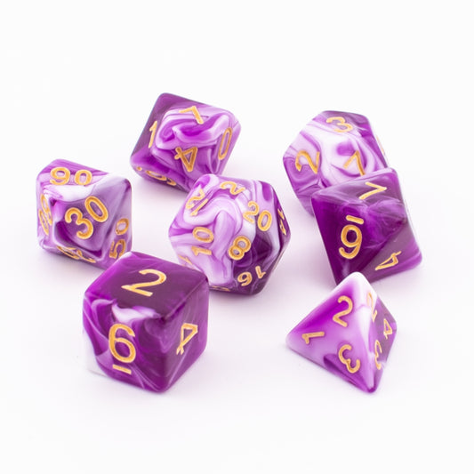 Pink, purple, and white Celestial Whisper dice arranged on a white background.