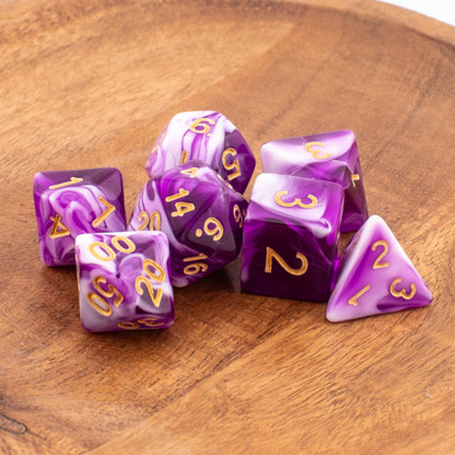 Celestial Whisper dice neatly arranged on a wooden surface.