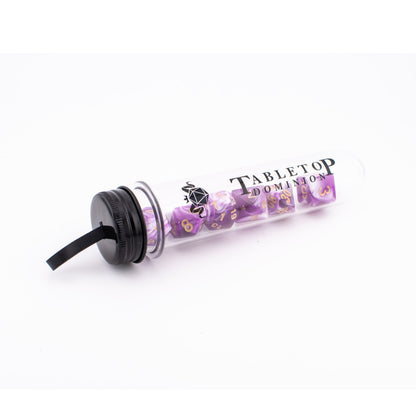 Celestial Whisper acrylic dice displayed inside a Tabletop Dominion dice tube.