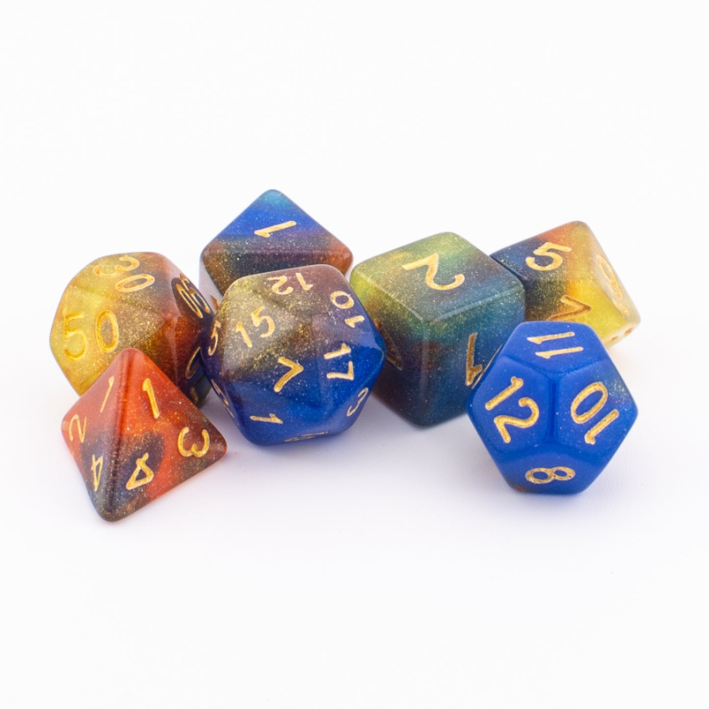 Clustered Starlight Cascade acrylic dice showing red, orange, yellow, blue, and green colours.