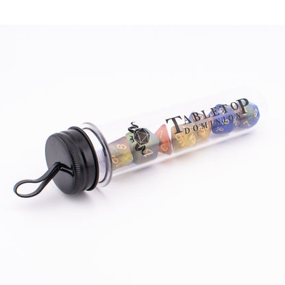 Starlight Cascade acrylic dice displayed inside a Tabletop Dominion dice tube.