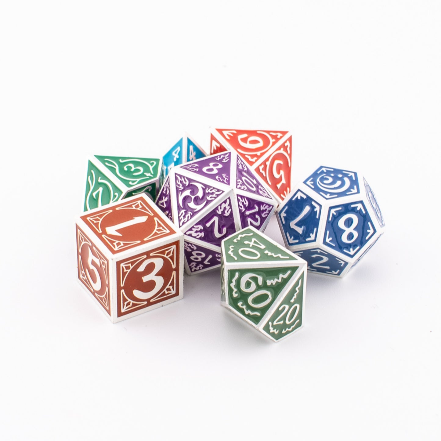 Tabletop Dominion Prismatic Elemental metal dice arranged together on a white background, showing multicoloured engraved designs across all seven polyhedral shapes.