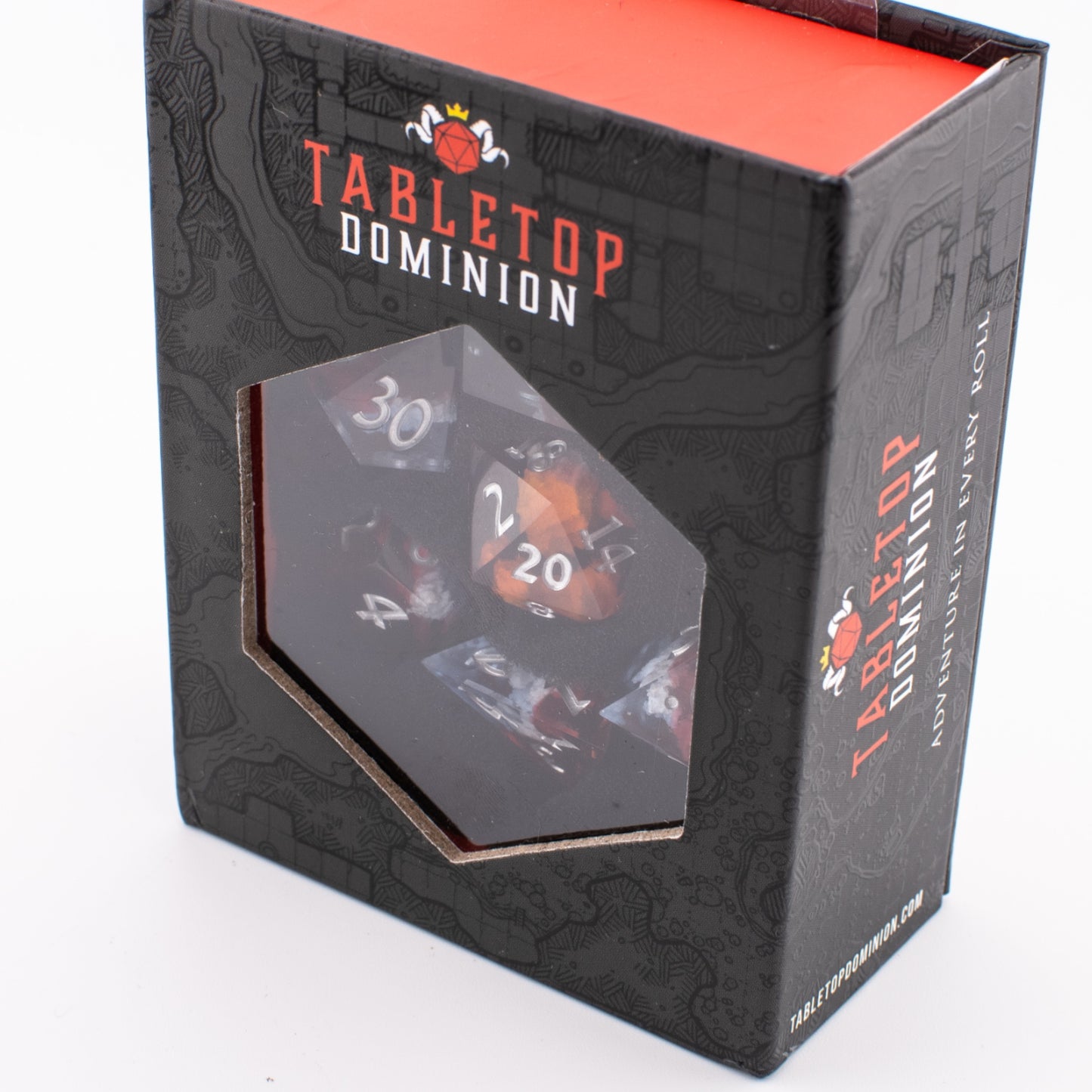 Ember Cloud resin dice packaged in a closed Tabletop Dominion box, with product branding visible on the front.